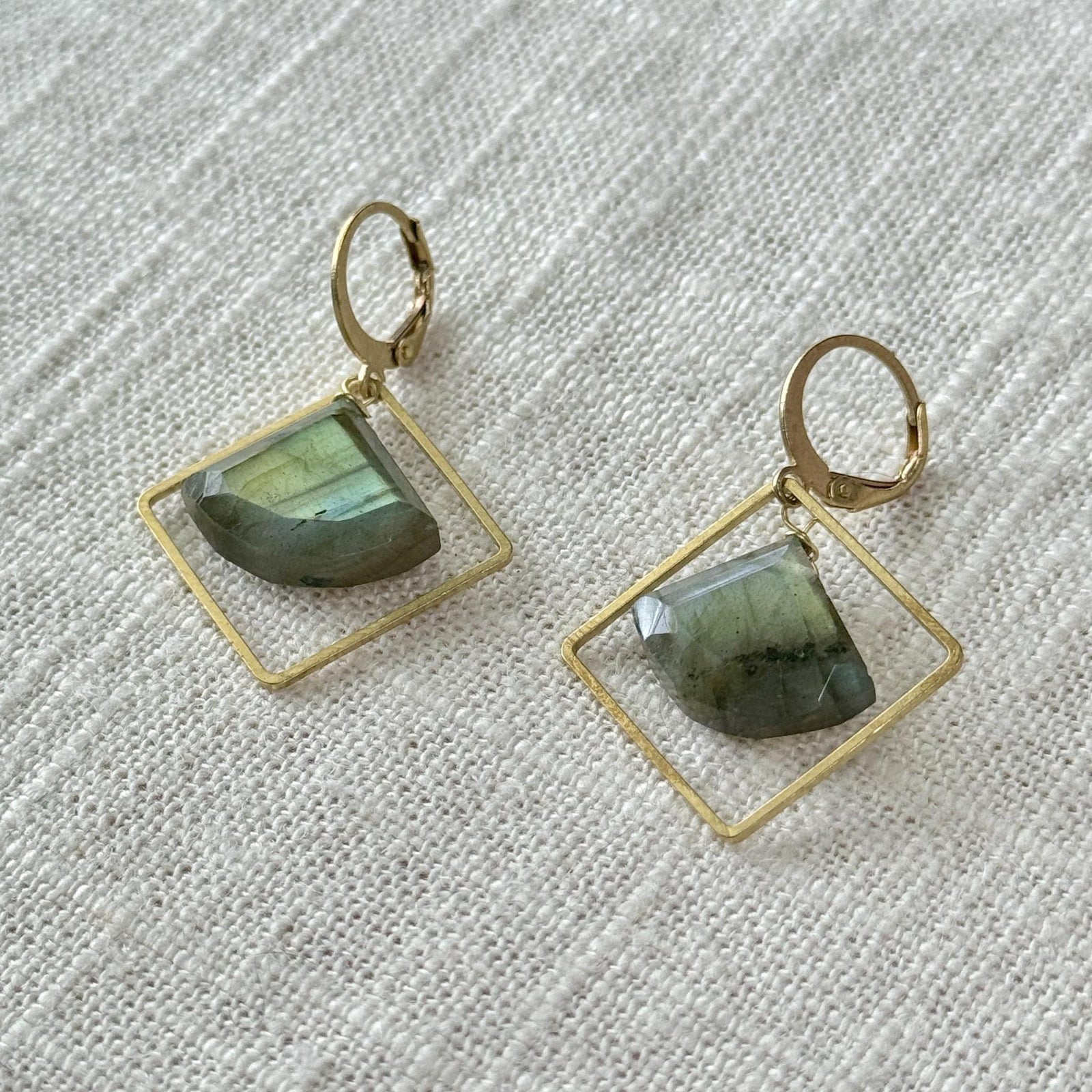 The Spellcrafter Labradorite Framed Diamond Earring features gold hypoallergenic brass hoops with open square...