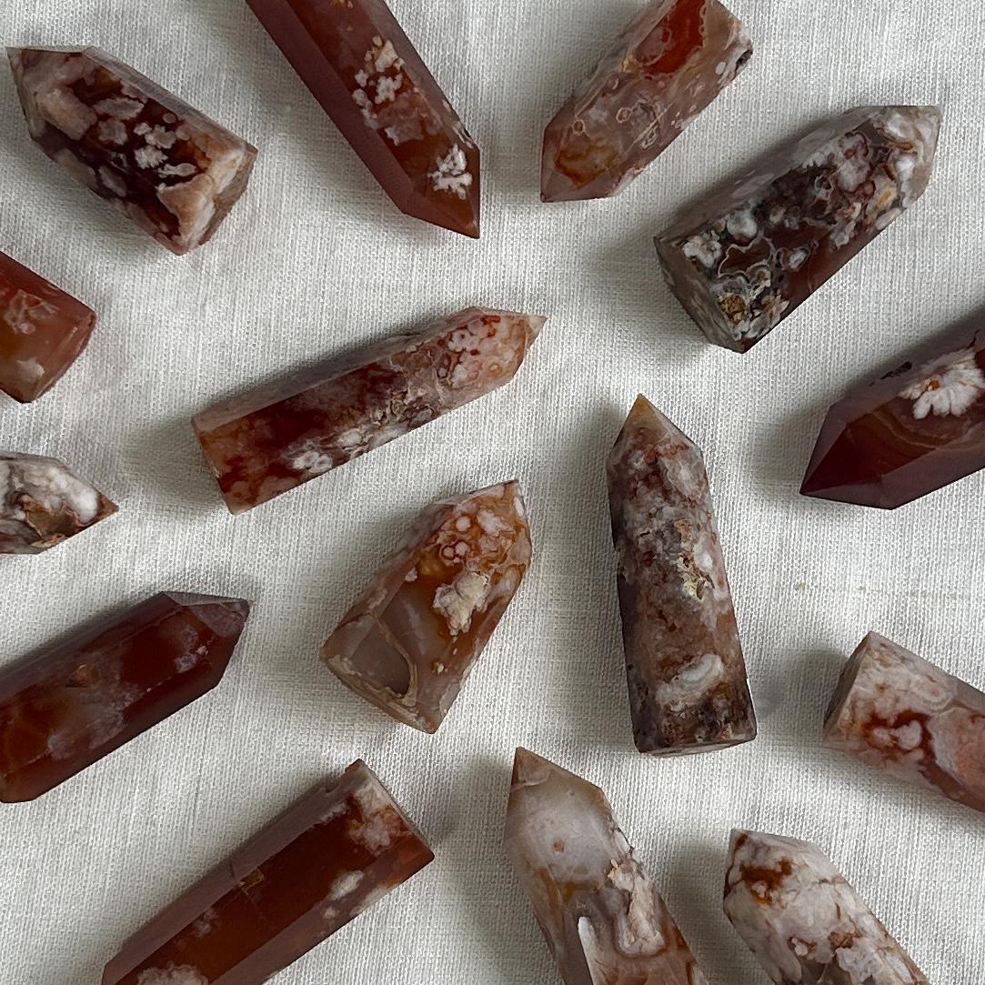 The Spellcrafter Carnelian Flower Agate Mini Tower Intuitively Chosen features polished, pointed crystals with...