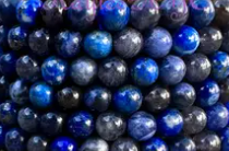 A close-up image shows rows of shiny beads from the Spellcrafter Third Eye Chakra...