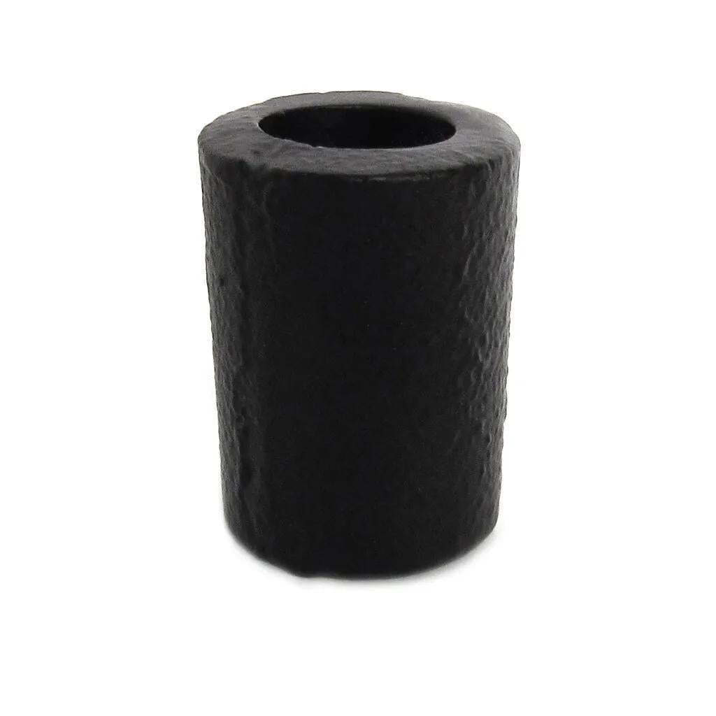 The Spellcrafter Chime Candle Holder is a small, cylindrical black foam piece with a hollow center, textured surface, and flat ends—perfect for holding 1/2 inch candles. Shown here against a white background.